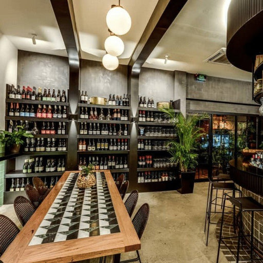 A Signature Wine - Led Dining Experience At Meccanico Espresso + Wine - We Wander